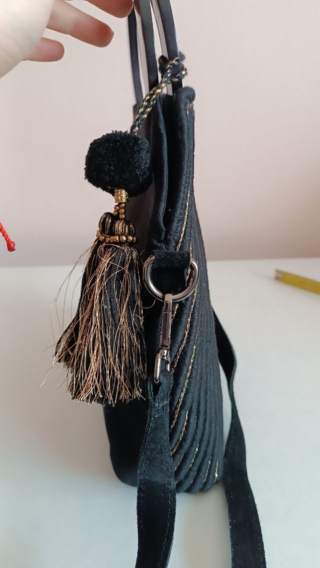 Bolso con piel I. Code