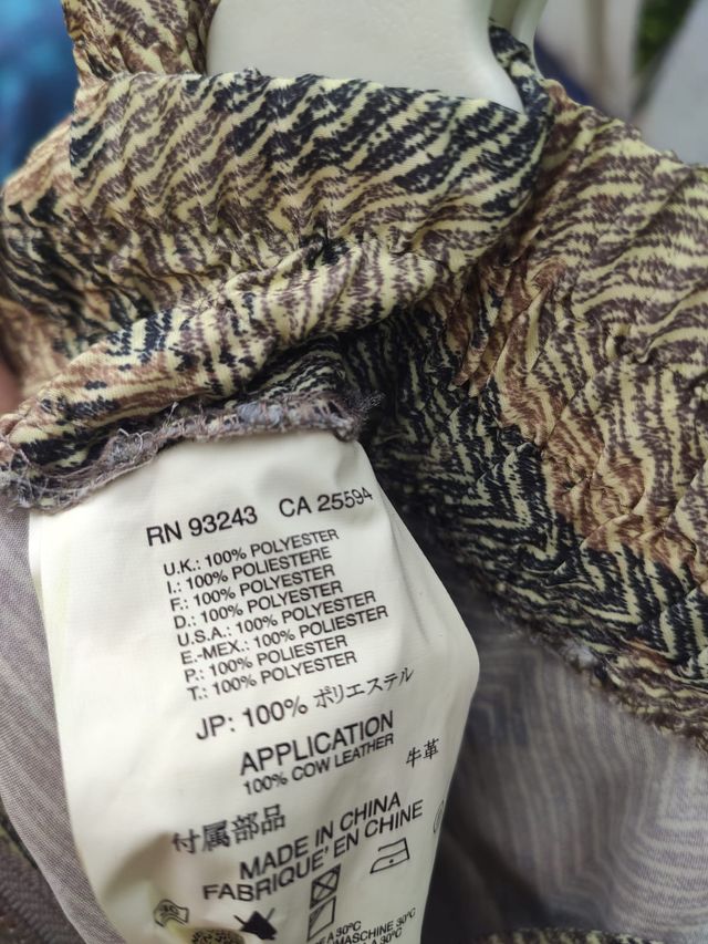 Pantaloni Diesel. Fantasia pitonati da donna.