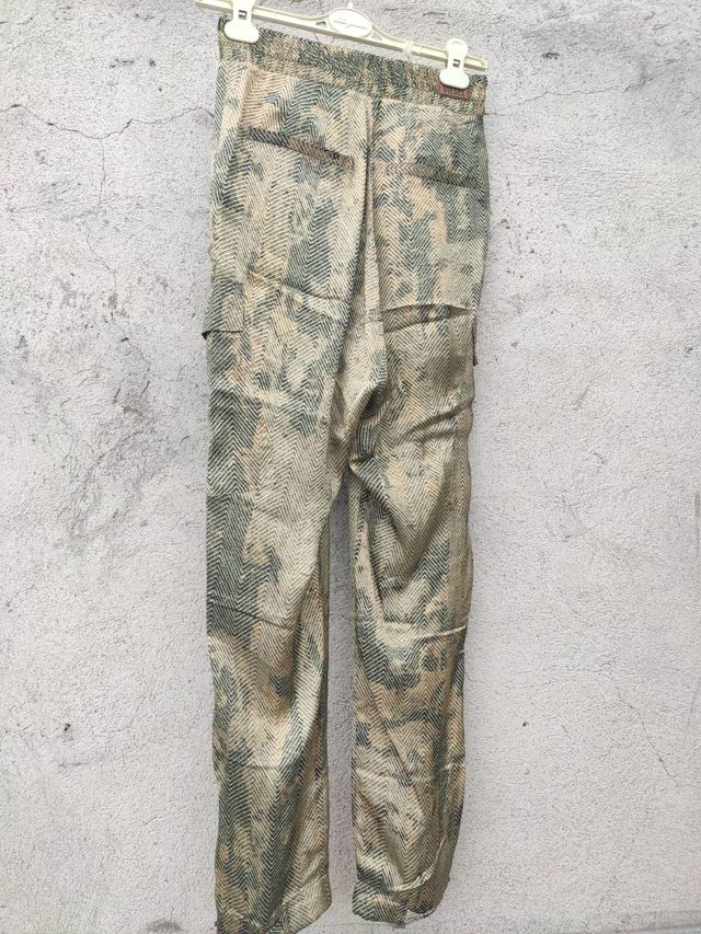 Pantaloni Diesel. Fantasia pitonati da donna.