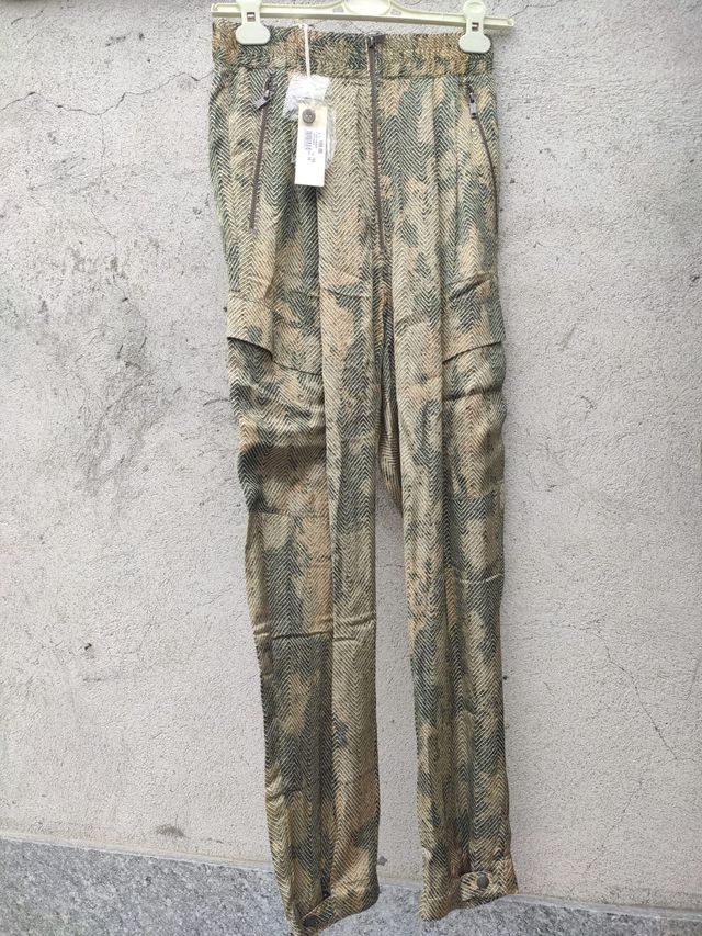 Pantaloni Diesel. Fantasia pitonati da donna.