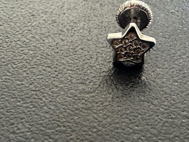 Piercing estrella oro blanco y circonitas