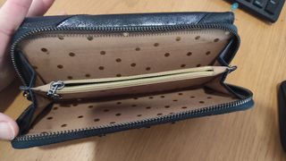 Cartera desigual bastante usada