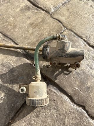 Sistema frenado trasero para freno disco.