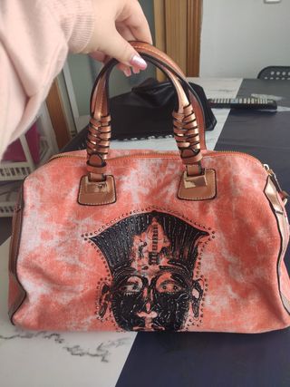 Bolso naranja con dibujo