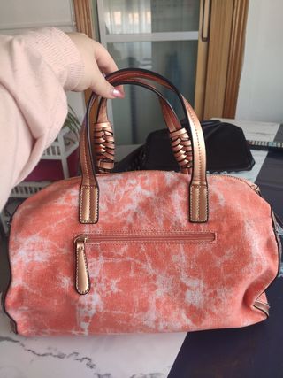 Bolso naranja con dibujo