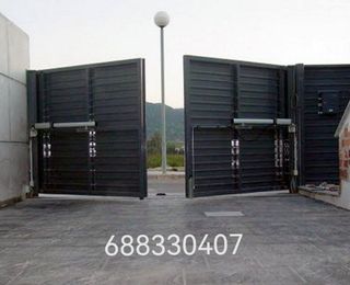 PUERTAS AUTOMÁTICAS Y MANUALES