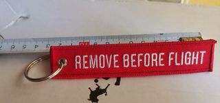 Llavero Remove before Flight