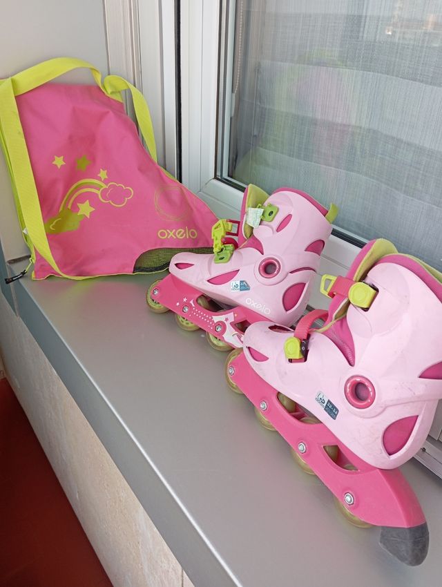 Patines en linea, con bolsa.