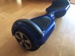 Hoverboard azul . Patín eléctrico