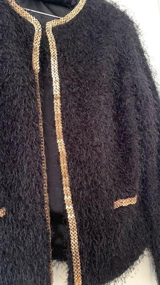 Chaqueta con ribete comunion . 