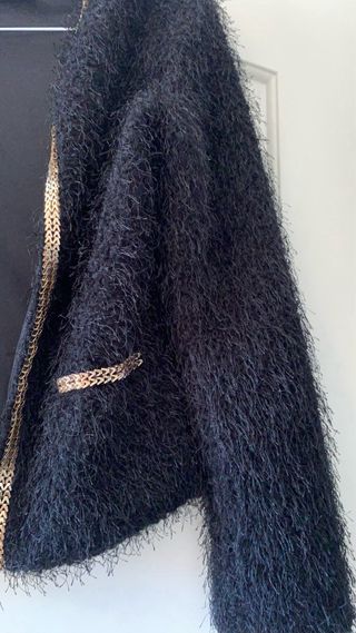 Chaqueta con ribete comunion . 