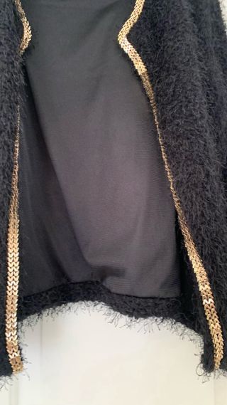 Chaqueta con ribete comunion . 