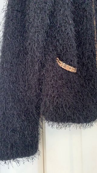 Chaqueta con ribete comunion . 