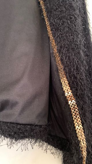 Chaqueta con ribete comunion . 