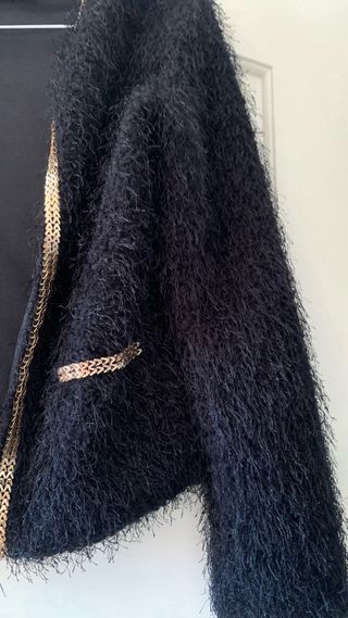 Chaqueta con ribete comunion . 