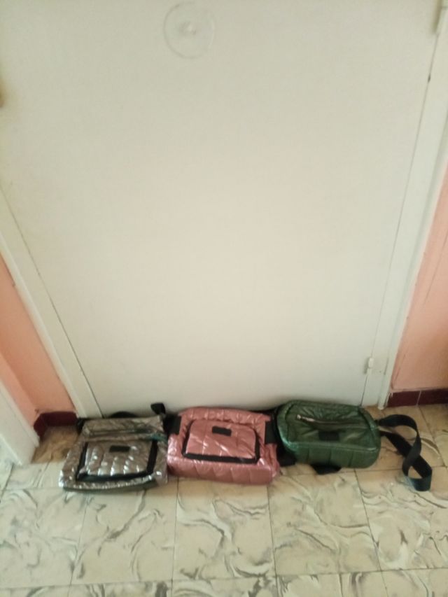 Bandoleras y un bolso de 3 colores DH