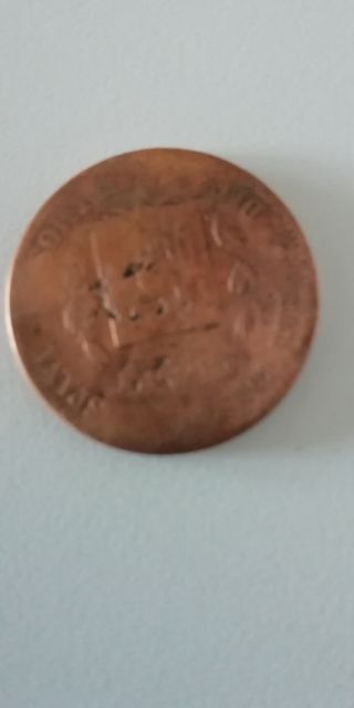 Moneda antigua del 1877