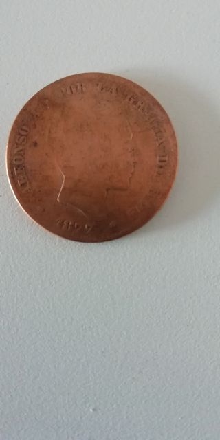 Moneda antigua del 1877