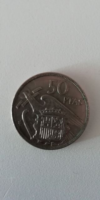 Moneda antigua del 1957