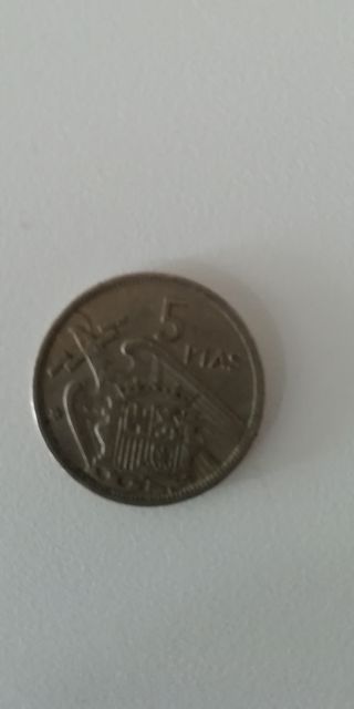 Moneda antigua del 1957