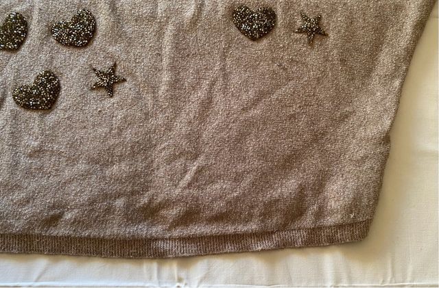 Maglia donna con maniche a pipistrello e decori