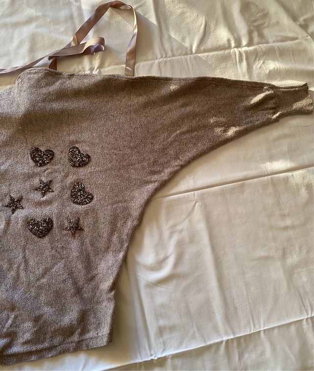 Maglia donna con maniche a pipistrello e decori