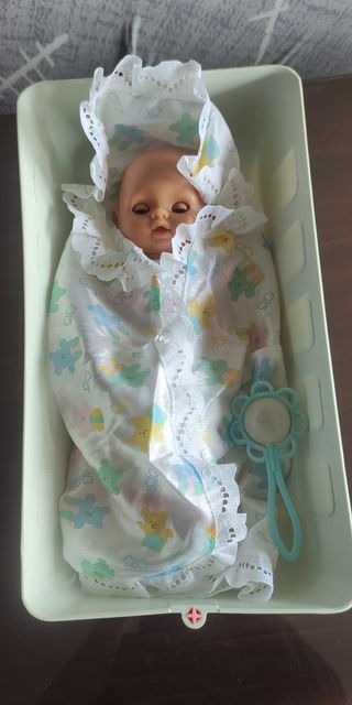 Barriguita con cuna y sonajero