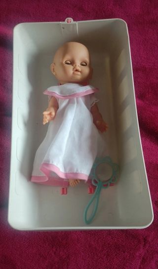 Barriguita con cuna y sonajero