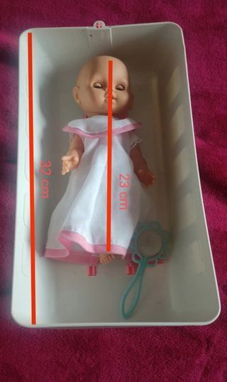 Barriguita con cuna y sonajero