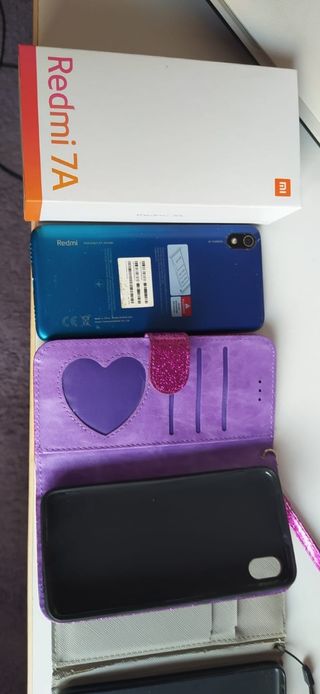 Teléfono móvil Xiaomi 7A con 3 fundas