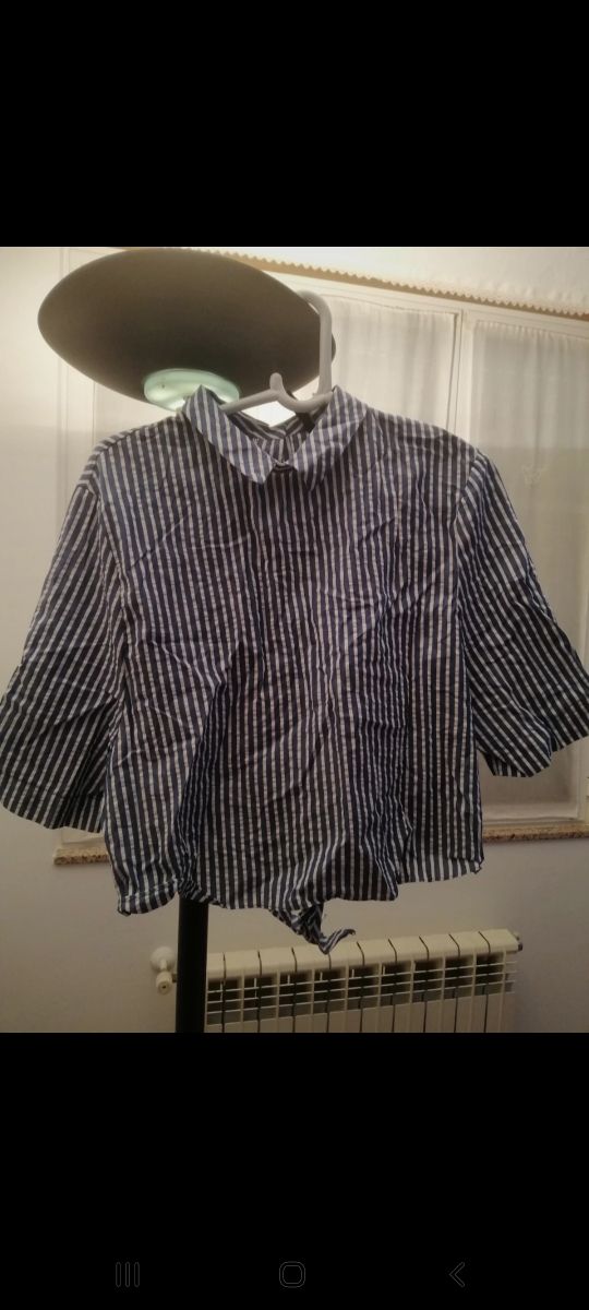 Camisa de rayas azules y blancas de Zara