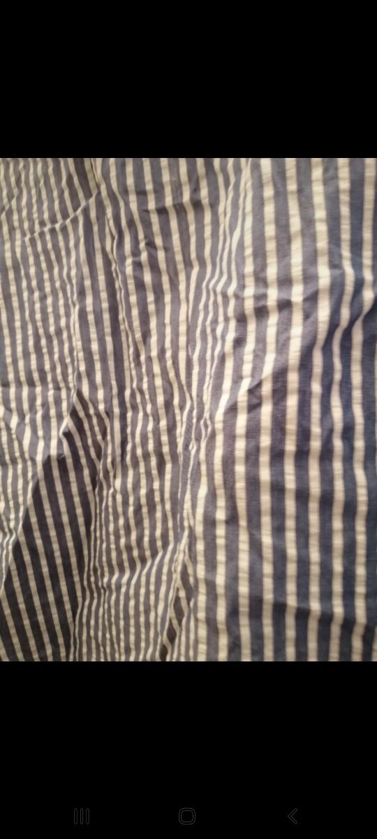 Camisa de rayas azules y blancas de Zara