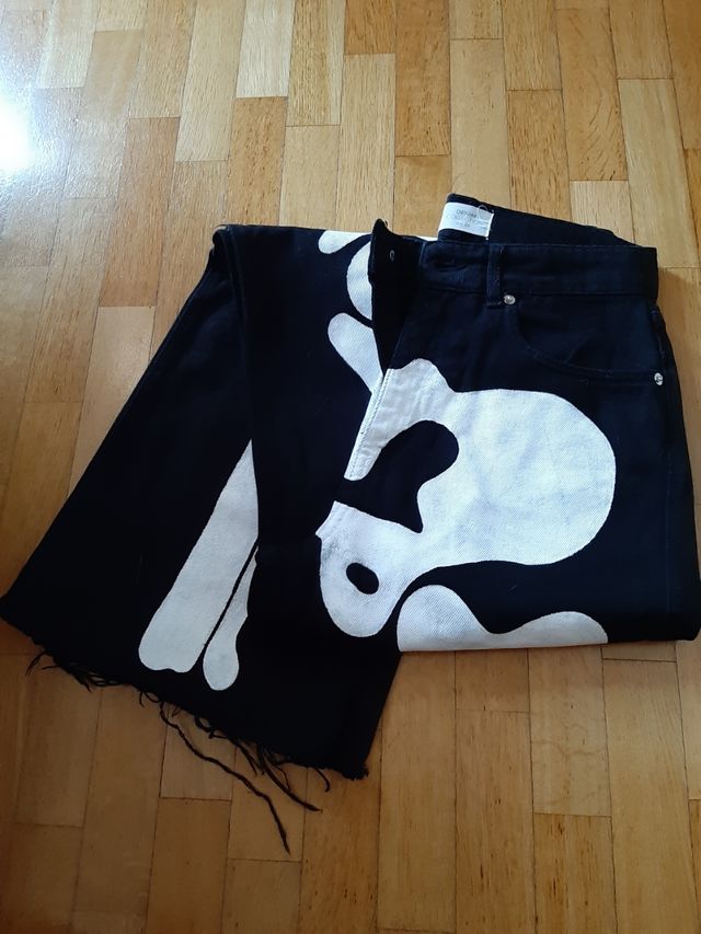 Jeans neri decorati a mano