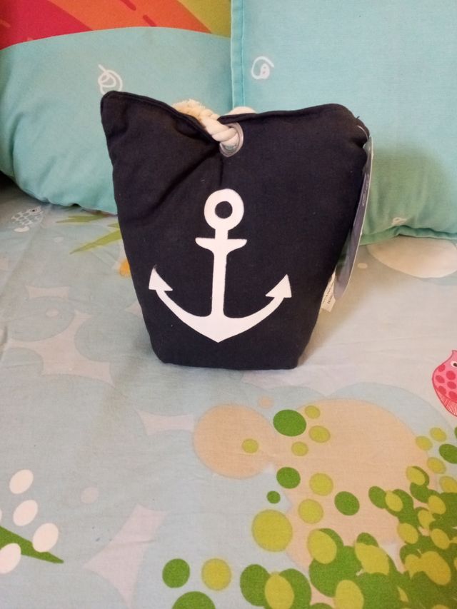 Tope de puertas anclado