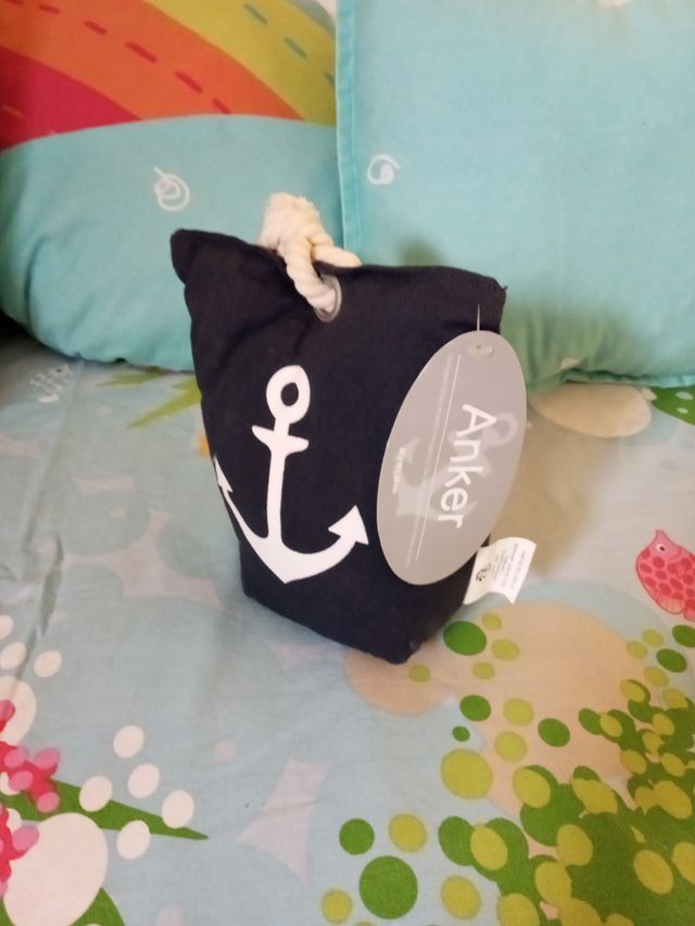 Tope de puertas anclado