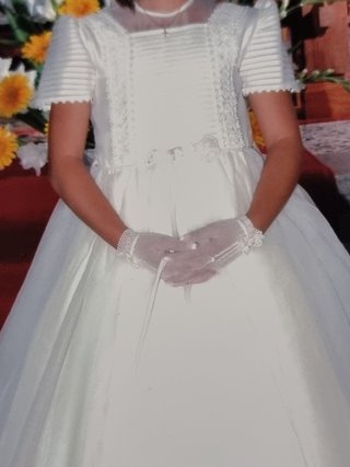 Vestido de primera comunión impecable.