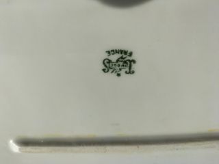 Set de 10 platos llanos de porcelana Limoges.