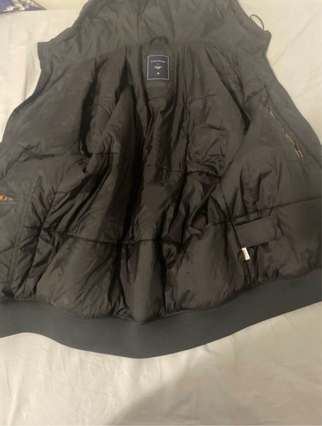 Chaqueta negra scalpers