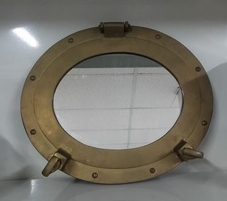 Espejo ojo de buey de latón