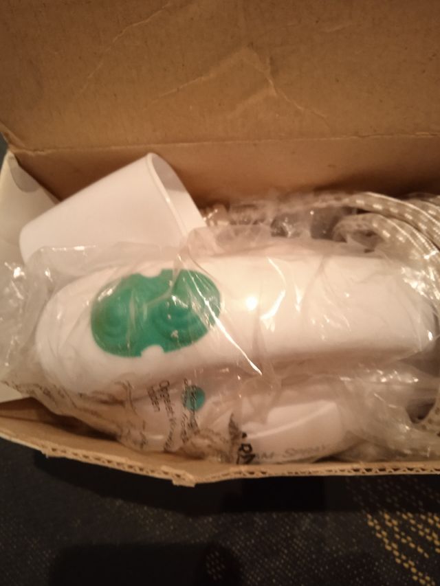 Plancha de viaje sin estrenar