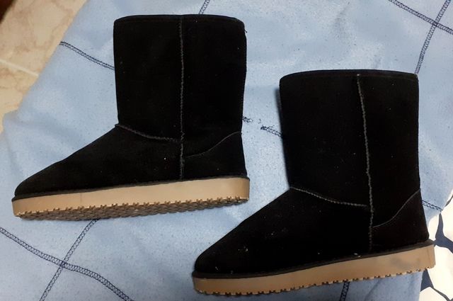 Botas de pelo negro