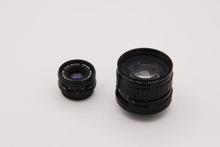 Pentax 110 objetivos  50mm 2.8 y 24mm 2.8