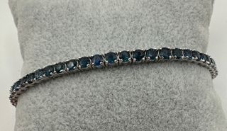 Pulsera riviere de oro de 18 kt con zafiros 7.00