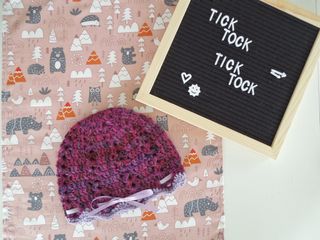 Cappellino bimba con fiocchetto in raso lilla
