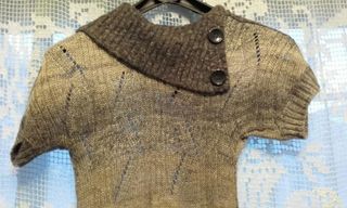 Vestido comprido em malha com bolsos