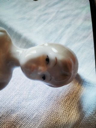 Ballerina seduta di porcellana finiss