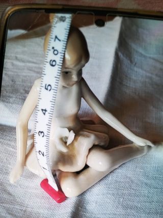 Ballerina seduta di porcellana finiss