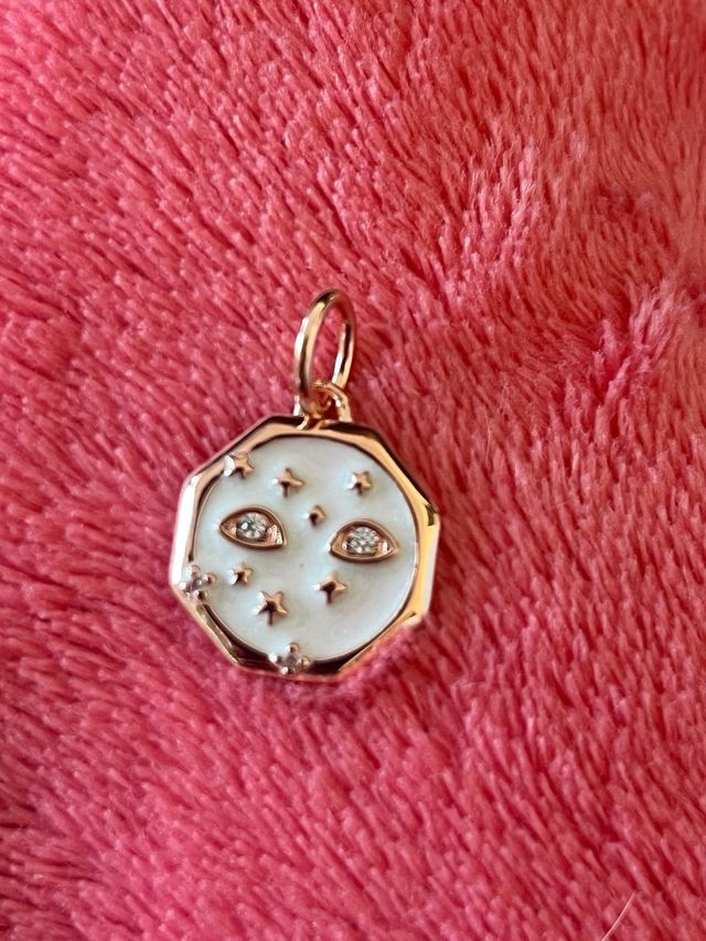 charm de plata ojos y estrellas
