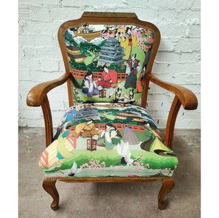 Butaca de madera con brazos