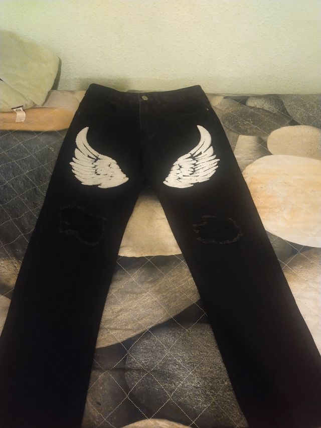 Vaqueros negros alas